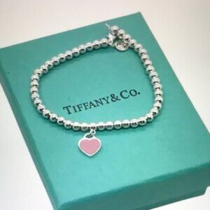 Tiffany & Co. Silver Bracelet with Pink Heart Charm